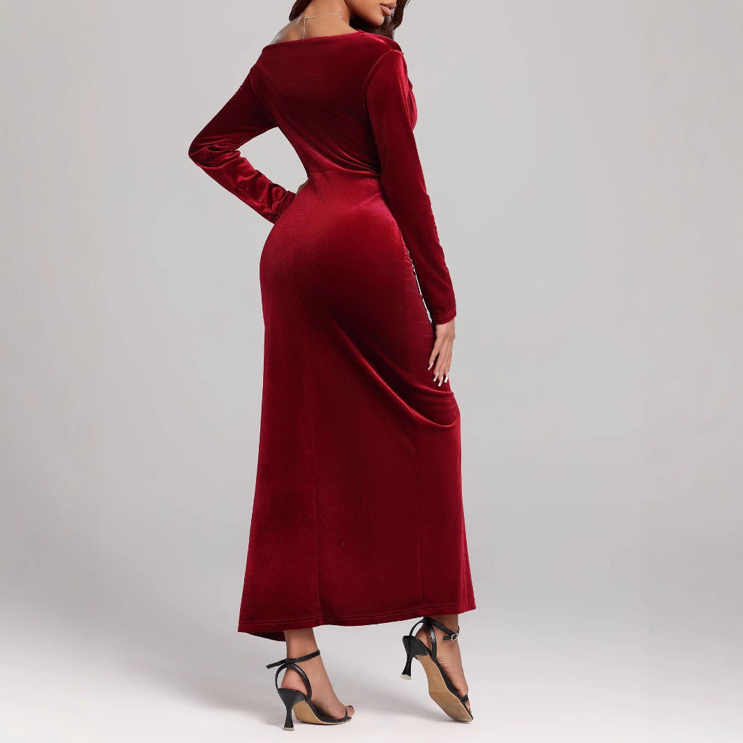 Long-sleeved dress with side slit and draping