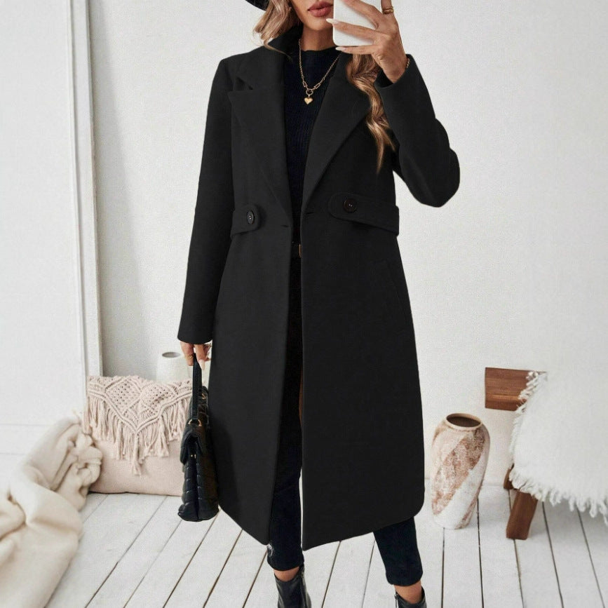 Coat with lapel collar and button placket