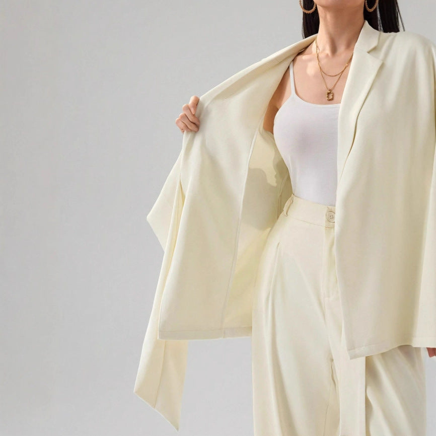 Two-piece suit with wrap blazer and straight-leg pants